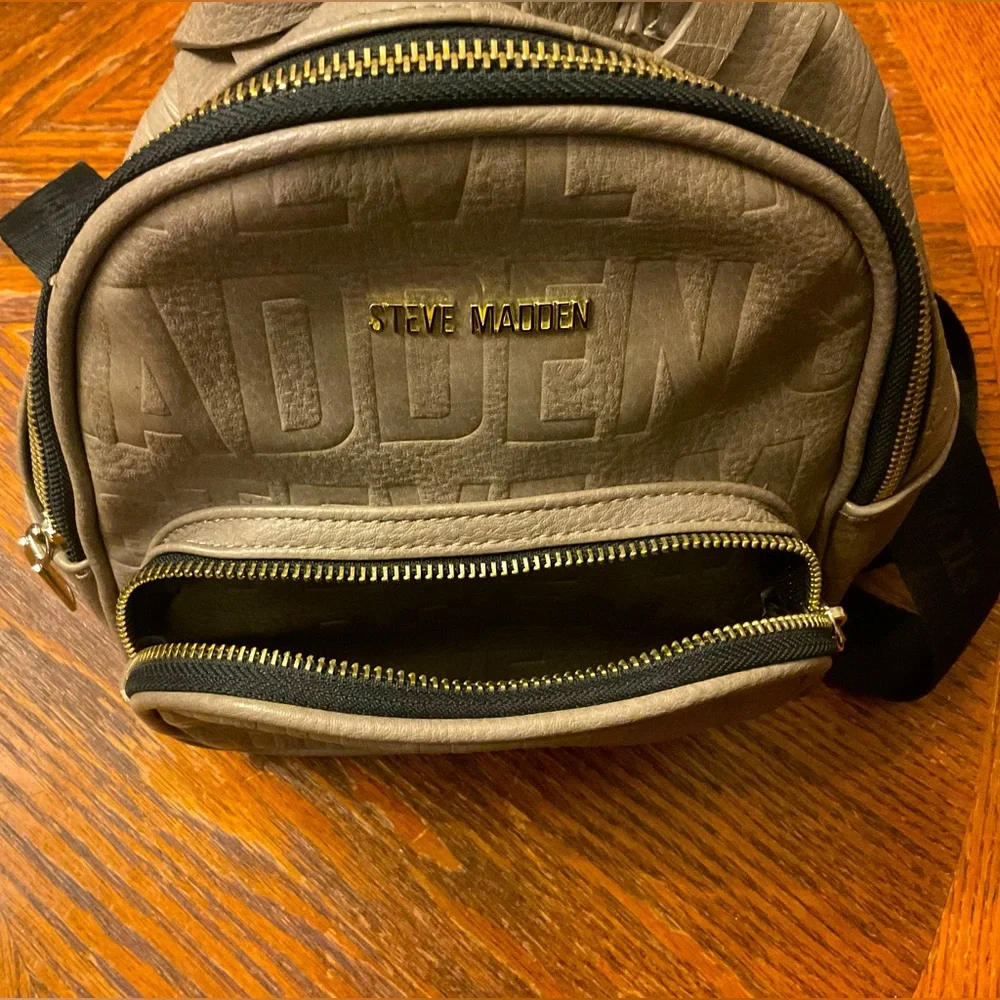 Steve Madden Cute Stylish Durable Mini Backpack Fringe Bag!